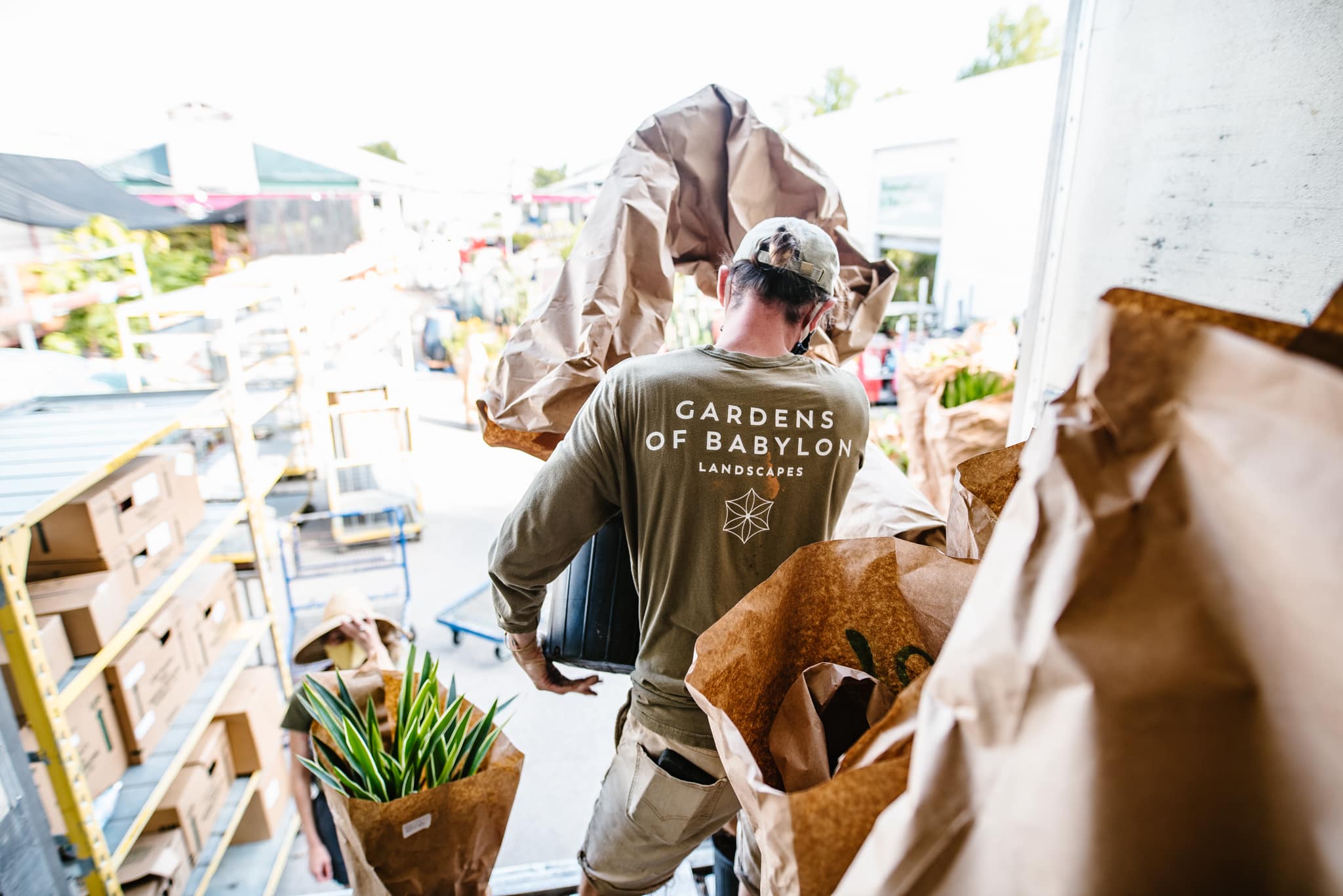 Woman holding plants